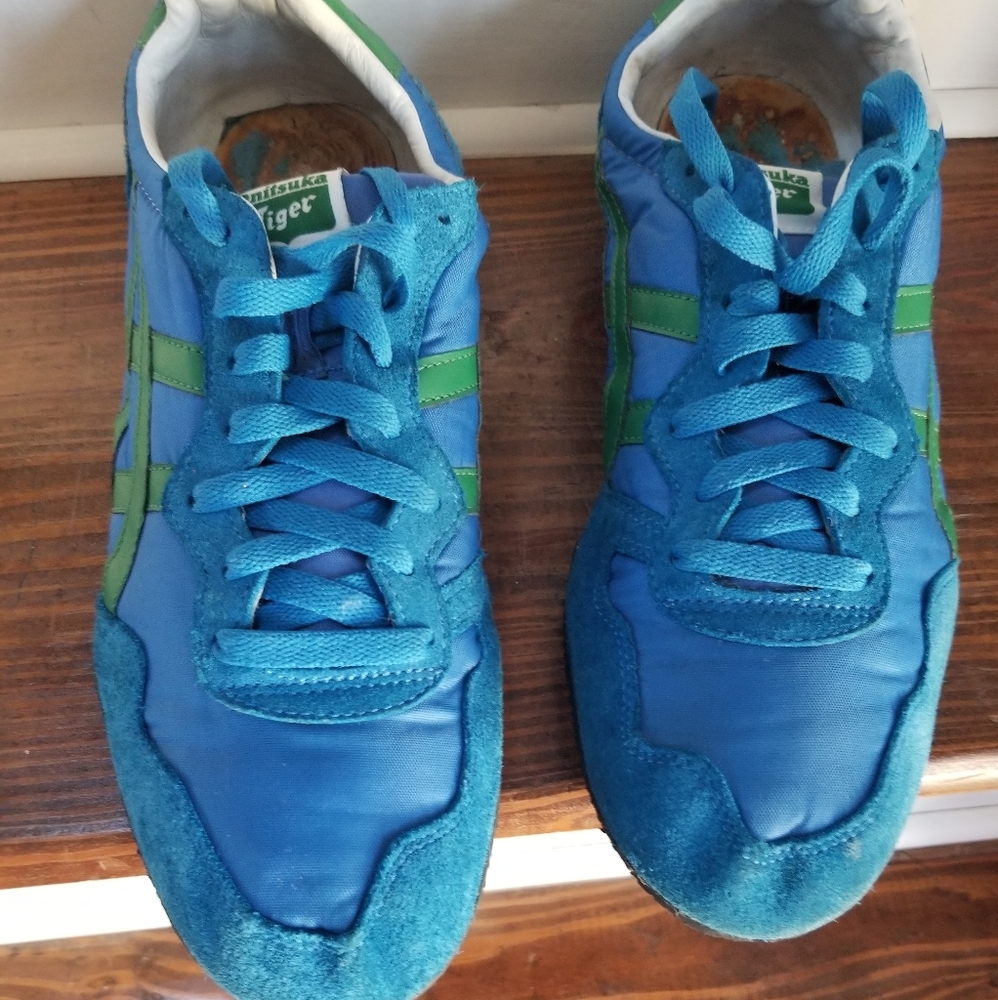 These are a pair of used onitsuka tiger shoes.
